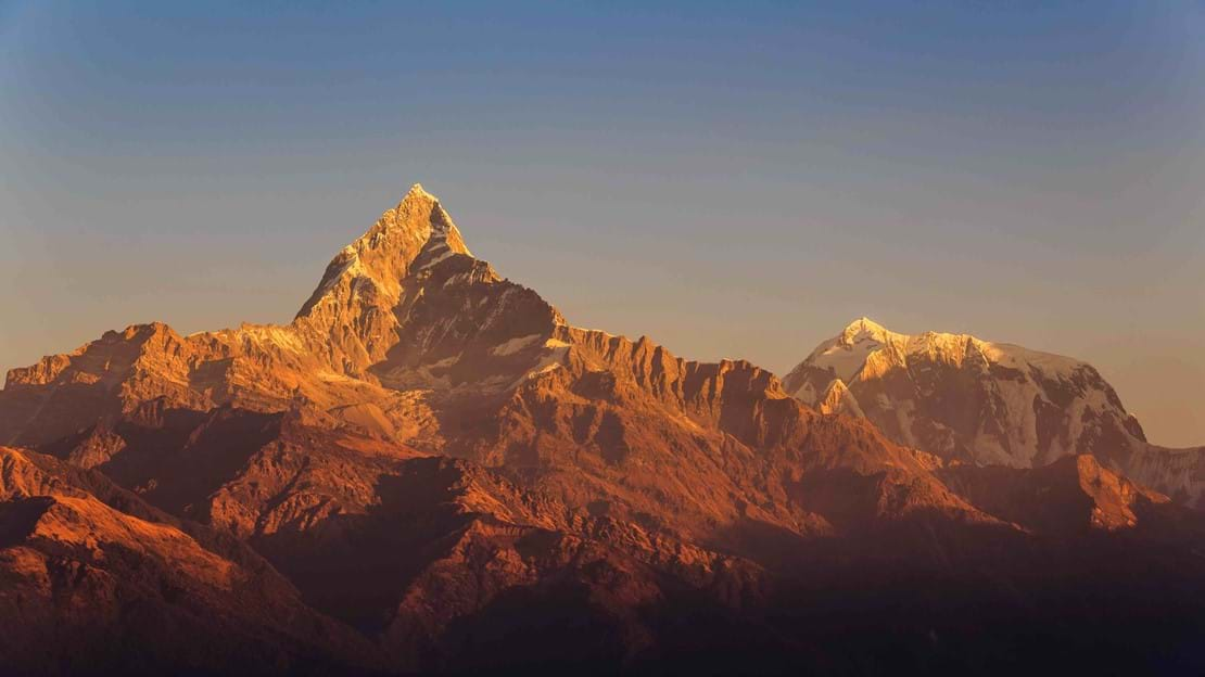 Golden sunrise light on a Himalayan peak in Nepal